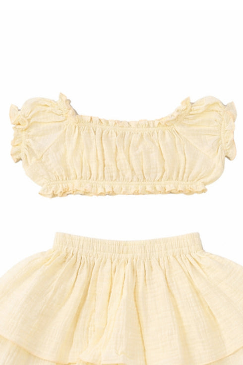 Close-up of the Hawaii Ruffle Set crop top in yellow cotton with frilled puff sleeves and elastic hem | Bali Bubs