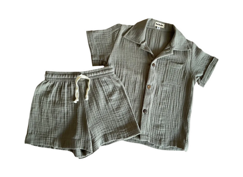 Set of gray plaid shirt and shorts on a white background