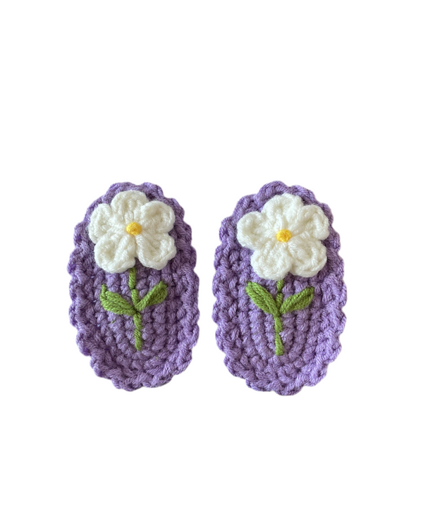 Pair of purple hand made crocheted hair accessories