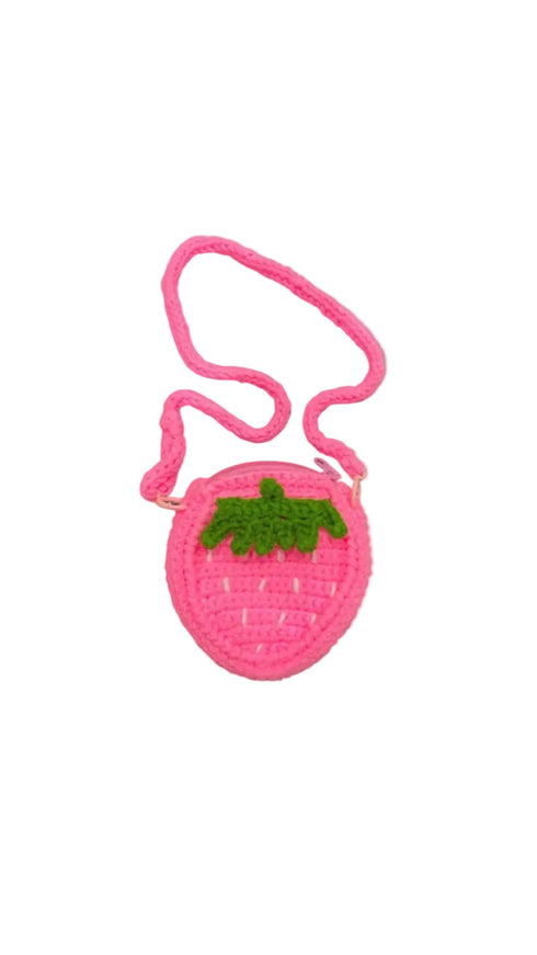 Handmade pink crochet strawberry bag for kids with green leaf and zip, made in Bali by Bali Bubs