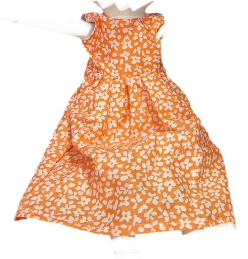 Orange dress with white floral pattern on a white background