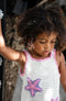 white and pink handmade crochet dress with starfish bali eco kids brand.