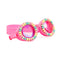 Pink swim goggles with colorful bead accents on a white background