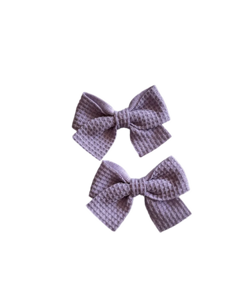 Two purple textured hair bows for kids