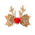 Gold glitter reindeer antlers with a red pom-pom on a white background