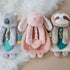 Baby with the Itzy Lovey Pink Bunny plush teether