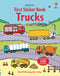 Book cover of 'First Sticker Book Trucks' with illustrations of various trucks on a road.