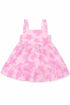 Pink tie-dye dress with ruffled skirt on a white background