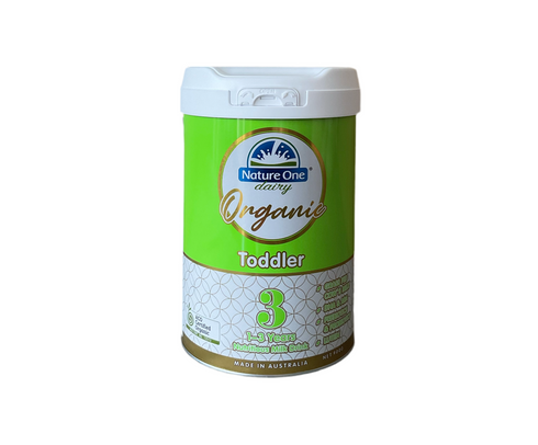 A can of Nature One Dairy Organic Toddler Formula Step 3, with green and white labeling, made in Australia.