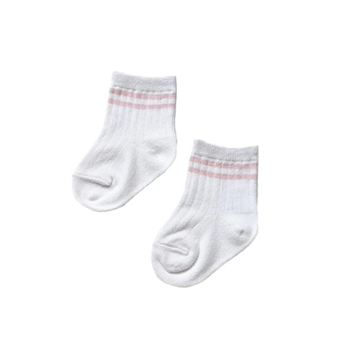 A pair of white baby socks with thin pink stripes near the cuff