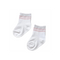 A pair of white baby socks with thin pink stripes near the cuff