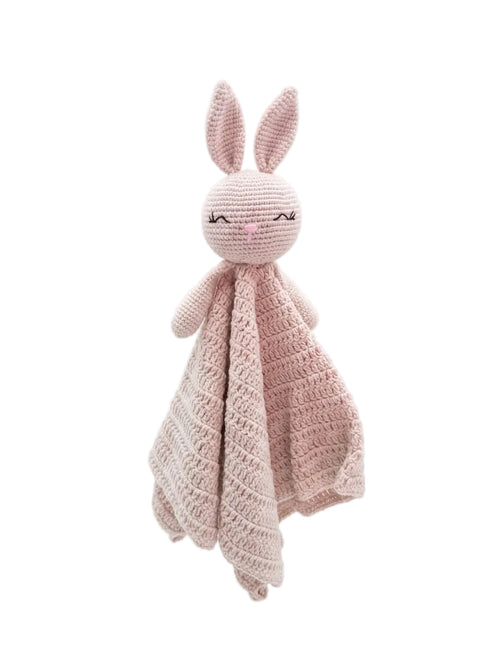 A crocheted bunny security blanket featuring a pale pink bunny head with long ears and a matching textured pink blanket