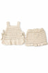 Beige crochet kids outfit handmade in Indonesia by talented artisans.
