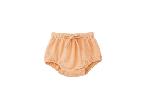 Orange baby bloomers on a white background