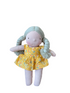 A fabric doll with a red and white checkered dress and green braided yarn hair.