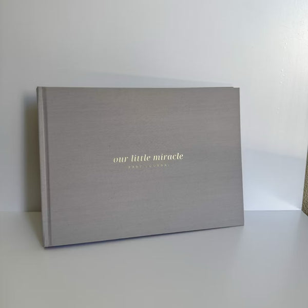 Fambam baby memory journal for the first year, grey linen keepsake book