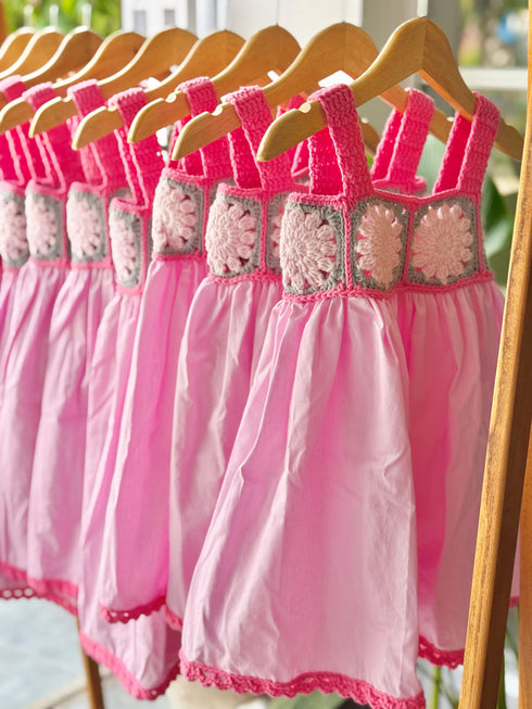 Pink dress with crochet details on the chest