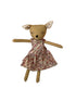A handmade doll with a beige deer-like head, patterned ears, and a flowery dress