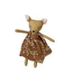 A small deer doll with a tan face and ears, wearing a brown dress.