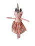 A pink plush unicorn doll with a gray horn and ears, wearing a pink and white gingham dress.
