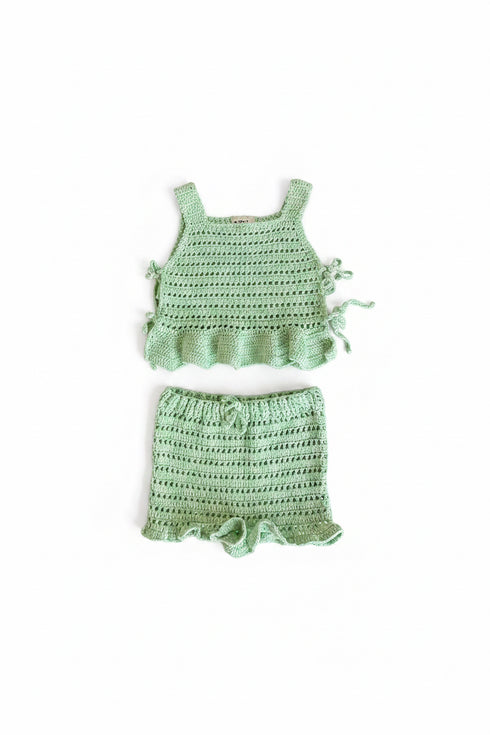 A light green crochet two-piece outfit