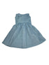 A light blue sleeveless dress with white polka dots
