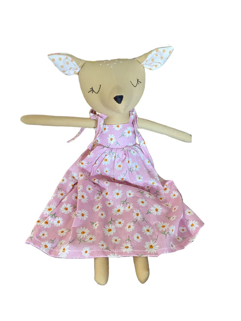 Doll with a pink floral dress
