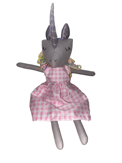 Unicorn-shaped plush toy with a pink checkered dress