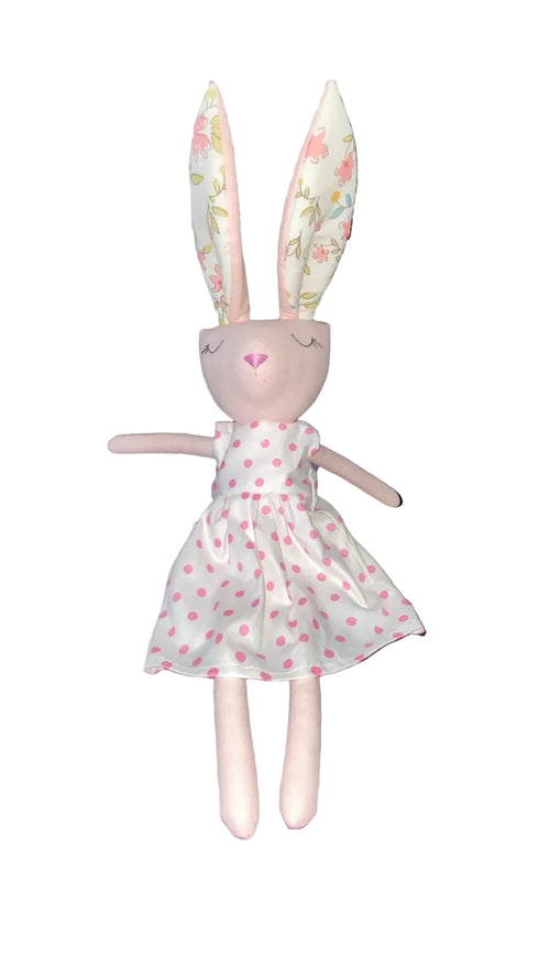 Stuffed bunny toy with a dress