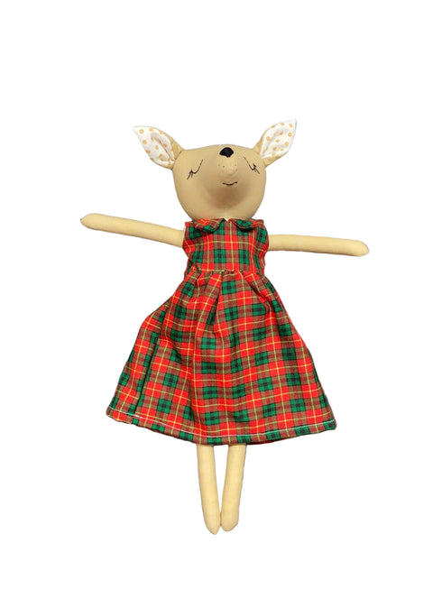 Stuffed animal toy with a red and green plaid dress on a white background