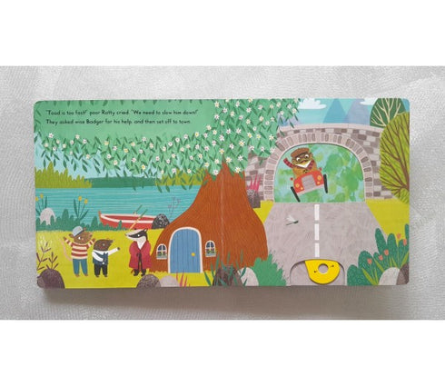Colorful children's book page with illustrations of animals and a house.