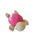 Crocheted turtle toy with pink shell on a gray surface