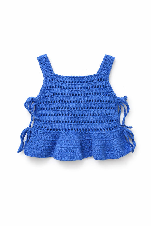 Blue crochet top with ruffled bottom on a white background