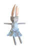 Stuffed toy rabbit in a blue dress
