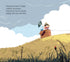 Illustration of a child in a cardboard box on a grassy hill with a blue sky and clouds.