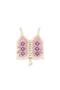 Crocheted pink and white top with floral patterns on a white background