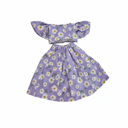 A purple off-the-shoulder dress with a white daisy floral print
