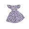 A purple off-the-shoulder dress with a white daisy floral print