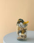 Glass jar filled with BIBS pacifiers in mixed colours