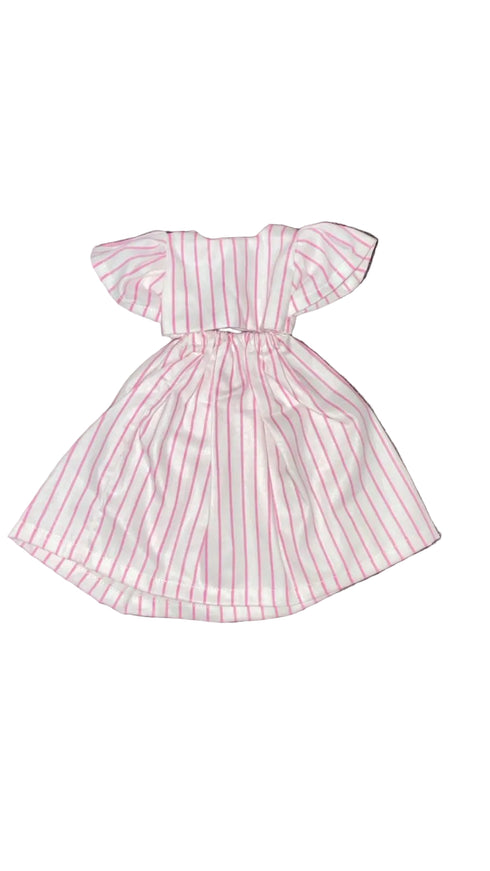 Pink and white striped dress on a white beground