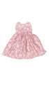 Pink floral dress on a white board