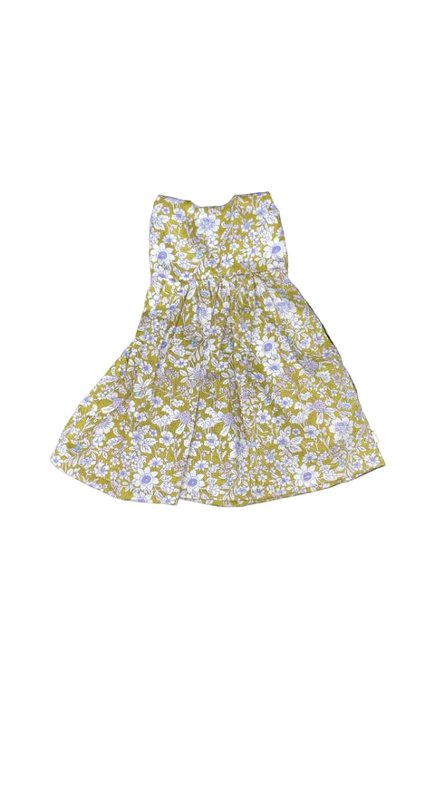 green floral dress on a white board