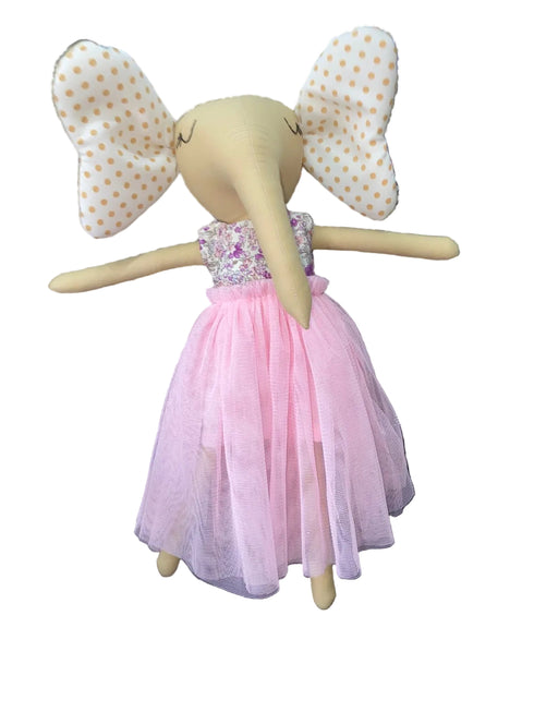 Doll with pink dress and polka dot wings
