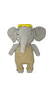 Crocheted elephant toy with a yellow hat on a white surface.