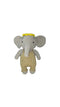 Crocheted elephant toy with a yellow hat on a white surface.