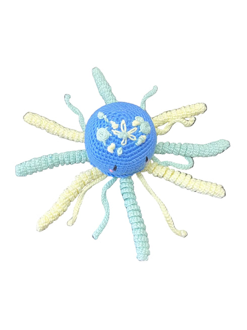 Blue ball with yarn extensions