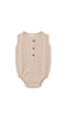 A sleeveless baby romper in a light beige linen-like fabric, featuring a three-button henley neckline and snap closures at the crotch