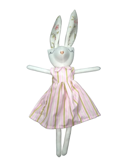 A white plush bunny toy with long floppy ears, wearing a pink and white vertically striped dress with thin yellow stripes.