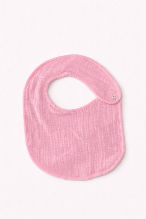 Pink baby bib on a white background