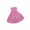 A pink strapless dress with white polka dots